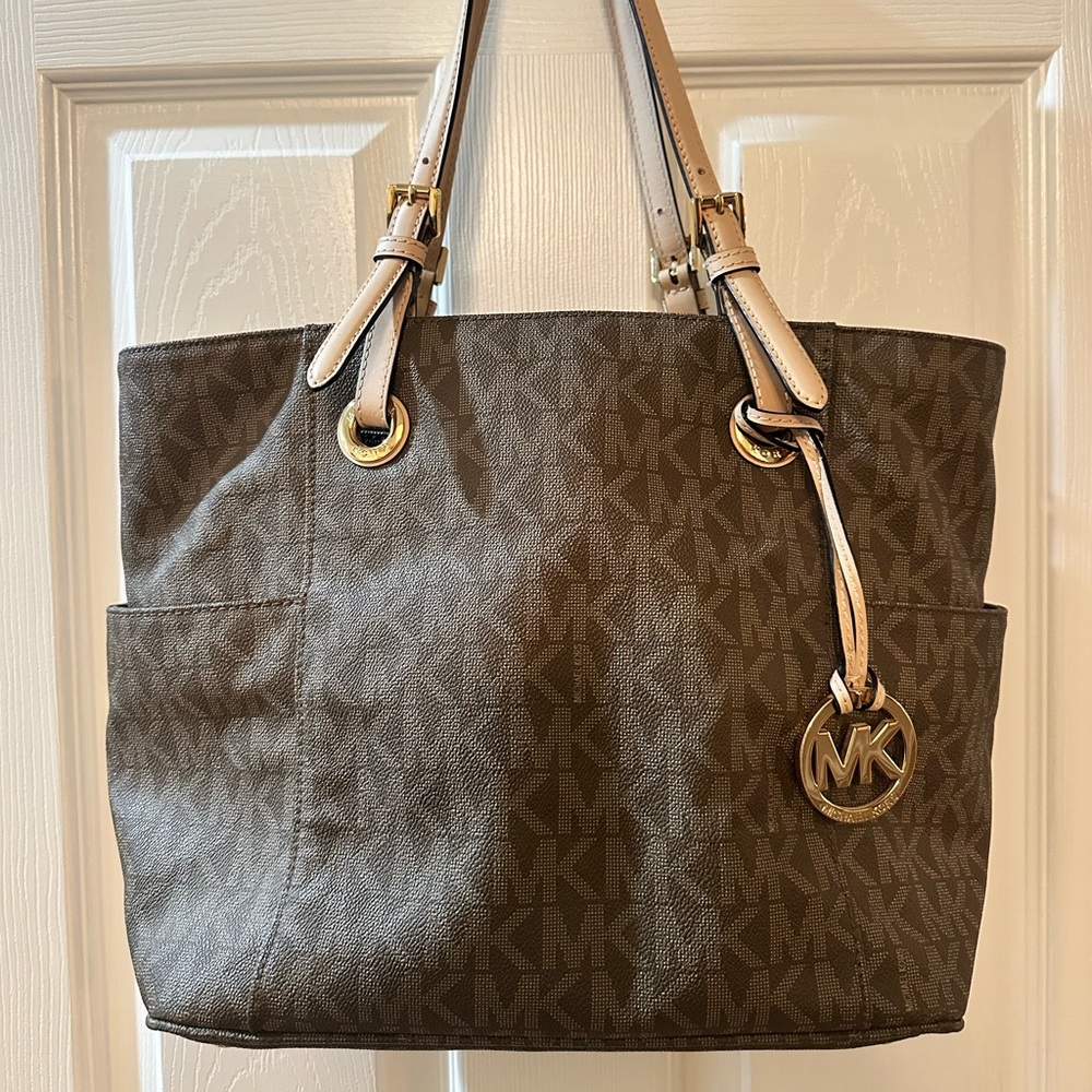 Authentic like new women’s Michael Kors, two tone brown, two strap leather purse